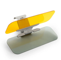 The clip-on visor on its own, amber night lens raised and smoked grey day lens lowered